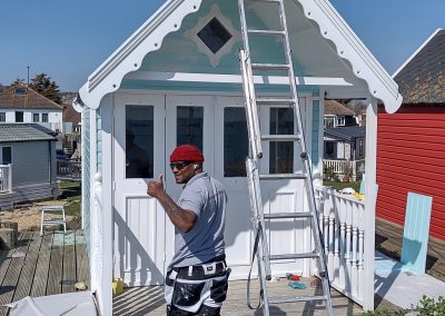 Beach hut decorating Lancing beach